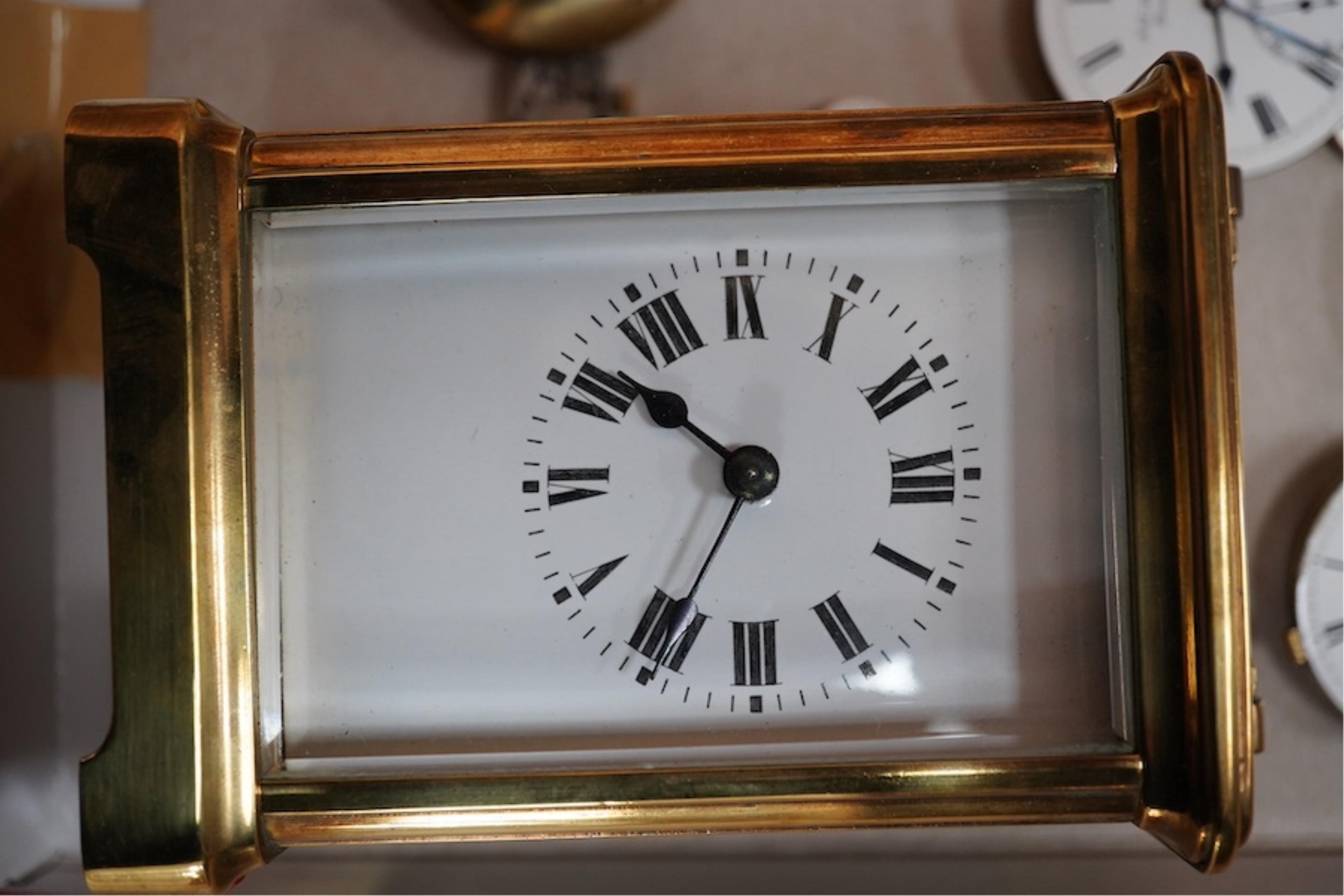 A brass cased carriage clock and assorted pocket watch movements, etc. Condition - varies